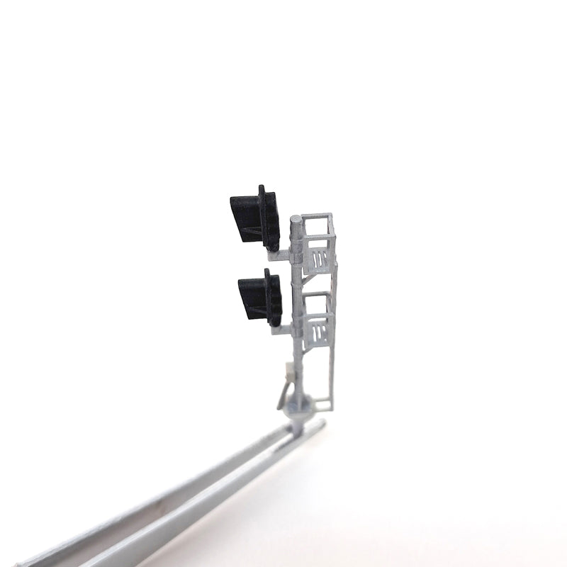 Top view of an N Scale double head signal with snow hoods.