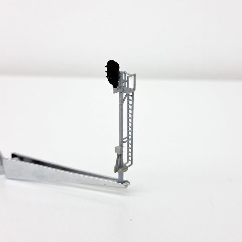 Front view of a model railroad signal electrical junction box.