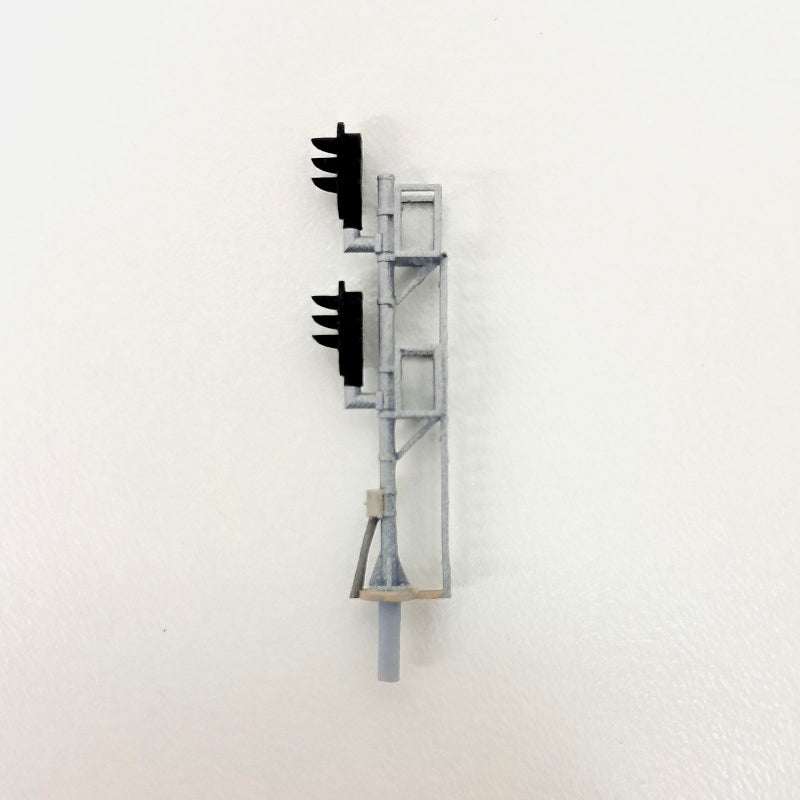 Side view of an N Scale model railroad signal.
