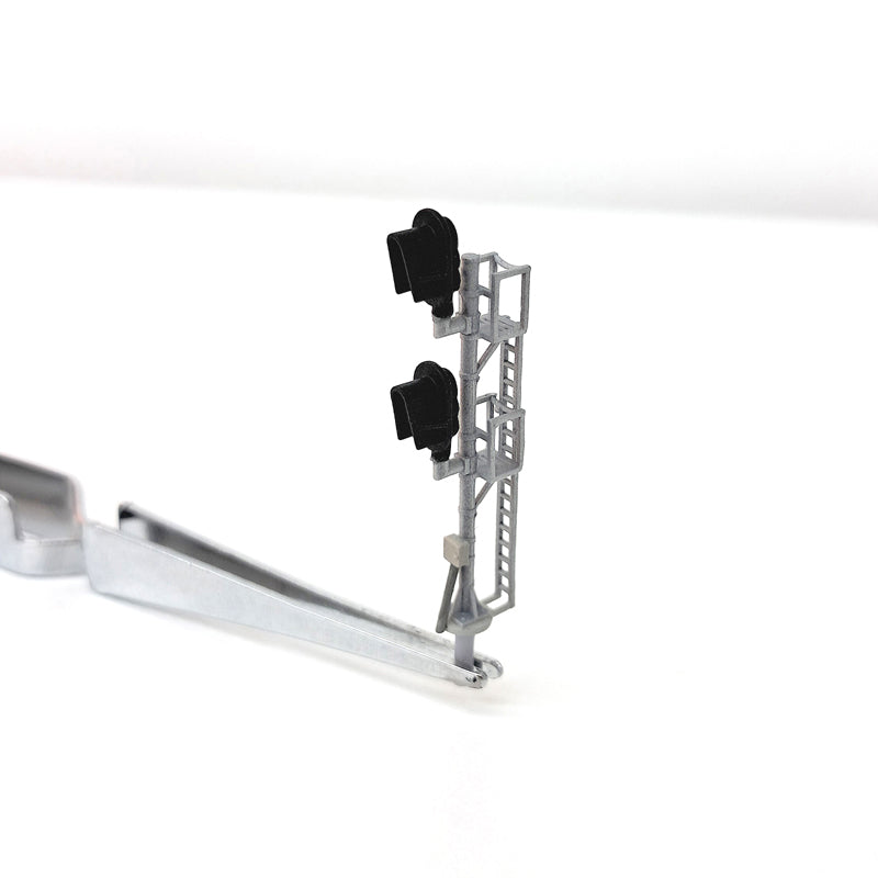 Front view of a model train double head signal.