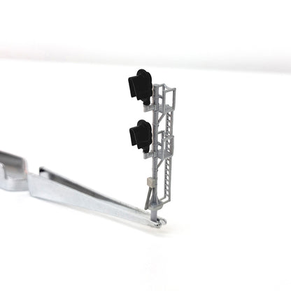 Front view of a model train double head signal.