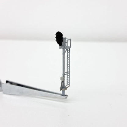 Front view of a model railroad signal electrical junction box.