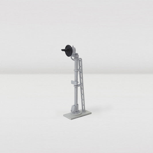 N scale single head searchlight signal model freestanding shown from side angle.