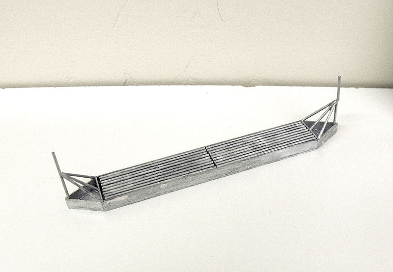 HO scale scratch built cattle guard with removable grates and cleanout.